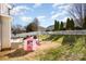 This backyard has a playset and a white picket fence at 4214 High Shoals Dr, Monroe, NC 28110