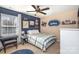 Stylish bedroom featuring a bed, window, and decorations at 4214 High Shoals Dr, Monroe, NC 28110