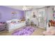 Bright bedroom with a unicorn theme, cozy rug, and plenty of natural light at 4214 High Shoals Dr, Monroe, NC 28110