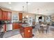 Updated kitchen with granite countertops, stainless steel appliances, and an island with seating at 4214 High Shoals Dr, Monroe, NC 28110
