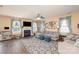 Spacious living room features a fireplace, large windows, and comfortable seating at 4214 High Shoals Dr, Monroe, NC 28110