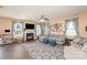 Bright living room with hardwood floors, a fireplace, and ample seating at 4214 High Shoals Dr, Monroe, NC 28110