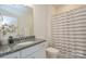 Bathroom with granite countertops, a white vanity, and a shower with a striped curtain at 4246 Millstream Rd, Denver, NC 28037