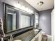 Bathroom featuring double sinks and a granite countertop, providing functionality and style at 4825 1St Street Nw Ct, Hickory, NC 28601