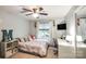 Well-lit bedroom featuring a built-in workspace and a comfortable bed for a cozy retreat at 4825 1St Street Nw Ct, Hickory, NC 28601