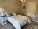 Bright bedroom featuring carpeting and natural light perfect for a restful retreat at 4825 1St Street Nw Ct, Hickory, NC 28601