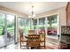 Inviting dining area with backyard views and access to the deck and screened-in porch at 4825 1St Street Nw Ct, Hickory, NC 28601