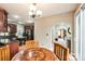 Open-concept kitchen and dining area with stainless steel appliances and easy access to living spaces at 4825 1St Street Nw Ct, Hickory, NC 28601