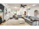 Spacious living room with comfortable seating and natural light from many surrounding windows at 4825 1St Street Nw Ct, Hickory, NC 28601