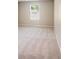 Well-lit bedroom with plush carpeting and large windows at 509 Holly St, Statesville, NC 28677