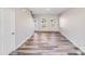 Bright living room with hardwood floors, neutral walls, with ample natural light from the windows at 509 Holly St, Statesville, NC 28677