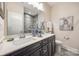 Stylish bathroom with a double sink vanity, white countertop, and modern fixtures at 517 Red Wolf Ln, Clover, SC 29710