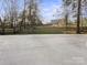 Long driveway with beautiful views of the neighboring properties at 5421 Woodcreek Dr, Charlotte, NC 28226