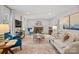 Bright living room featuring hardwood floors, a brick fireplace, and neutral decor at 5421 Woodcreek Dr, Charlotte, NC 28226