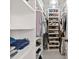 Walk-in closet offering ample storage space with shelves and hanging rods at 5421 Woodcreek Dr, Charlotte, NC 28226
