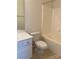 Bathroom showcasing vanity, toilet, and bathtub at 5963 Pale Moss Ln, Charlotte, NC 28269