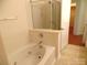 Bright bathroom featuring a soaking tub, shower and neutral color palette at 5963 Pale Moss Ln, Charlotte, NC 28269