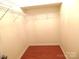 Walk-in closet with shelving and hardwood floor at 5963 Pale Moss Ln, Charlotte, NC 28269