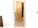 Hallway view of storage and kitchen access at 5963 Pale Moss Ln, Charlotte, NC 28269