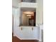 Open kitchen view featuring a breakfast bar, stainless appliances, and stylish cabinetry at 5963 Pale Moss Ln, Charlotte, NC 28269