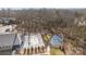 Aerial view of the community pool and tennis courts at 6015 Pleasant Run Dr, Matthews, NC 28104