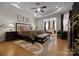 Spacious main bedroom features a trey ceiling, wood floors, and a sitting area at 6015 Pleasant Run Dr, Matthews, NC 28104