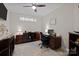 Comfortable office featuring hardwood floors, built-in storage, and ample space for work at 6015 Pleasant Run Dr, Matthews, NC 28104