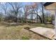 Backyard features a concrete patio bordered by brick at 629 Johns Ln, Gastonia, NC 28052