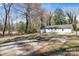 Spacious backyard with ample parking and a detached storage shed at 629 Johns Ln, Gastonia, NC 28052