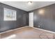 Bedroom with a window allowing natural light at 629 Johns Ln, Gastonia, NC 28052
