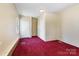Comfortable bedroom featuring carpet flooring and a large closet at 629 Johns Ln, Gastonia, NC 28052