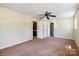 Spacious bedroom including carpet, ceiling fan, and closet space at 629 Johns Ln, Gastonia, NC 28052