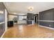 Open kitchen and dining area with sleek appliances and plenty of counter space at 629 Johns Ln, Gastonia, NC 28052