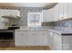 Updated kitchen showcasing stainless steel appliances and modern countertops at 629 Johns Ln, Gastonia, NC 28052