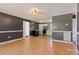 Inviting living room with hardwood floors that lead to the kitchen at 629 Johns Ln, Gastonia, NC 28052