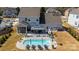 Amazing backyard with inviting pool, covered patio, and well-maintained lawn at 7133 Sumters Camp Trl, Fort Mill, SC 29707