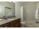 The bathroom has a single sink with granite countertop, a tub-shower combo, and a neutral color palette at 7133 Sumters Camp Trl, Fort Mill, SC 29707