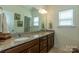 Bathroom features a dual sink with granite countertop and natural lighting at 7133 Sumters Camp Trl, Fort Mill, SC 29707