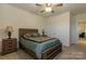 Bedroom with a Queen bed, bedside tables, and lots of natural light at 7133 Sumters Camp Trl, Fort Mill, SC 29707