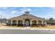 Charming community clubhouse featuring stone accents, white pillars and a welcoming entrance at 7133 Sumters Camp Trl, Fort Mill, SC 29707