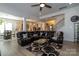 Spacious living area featuring fireplace, kitchen, and breakfast nook for open and connected living spaces at 7133 Sumters Camp Trl, Fort Mill, SC 29707