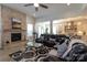 Open concept living room with fireplace and adjacent kitchen area with breakfast nook provide comfortable living space at 7133 Sumters Camp Trl, Fort Mill, SC 29707