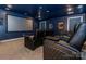 Entertainment haven featuring tiered seating, a large screen, and surround sound system at 7133 Sumters Camp Trl, Fort Mill, SC 29707