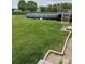 Spacious backyard featuring an above-ground pool and a large grassy area at 730 Jackson Rd, Salisbury, NC 28146