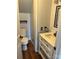 Stylish half bathroom with modern vanity, marble countertop, and updated fixtures at 730 Jackson Rd, Salisbury, NC 28146