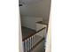 Bright bonus room features wood-look flooring and neutral walls with a wood railing at 730 Jackson Rd, Salisbury, NC 28146