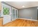 Cozy breakfast nook with bright natural light and hardwood floors at 8850 Hills Dell Dr, Concord, NC 28027