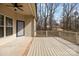 Back porch is partially covered and overlooks a treed backyard at 910 Pine Knoll Rd # 13, Fort Mill, SC 29715