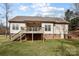 The backyard features a covered porch and walkout basement at 910 Pine Knoll Rd # 13, Fort Mill, SC 29715