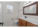 Bathroom features a vanity, toilet and framed mirror over the sink at 910 Pine Knoll Rd # 13, Fort Mill, SC 29715